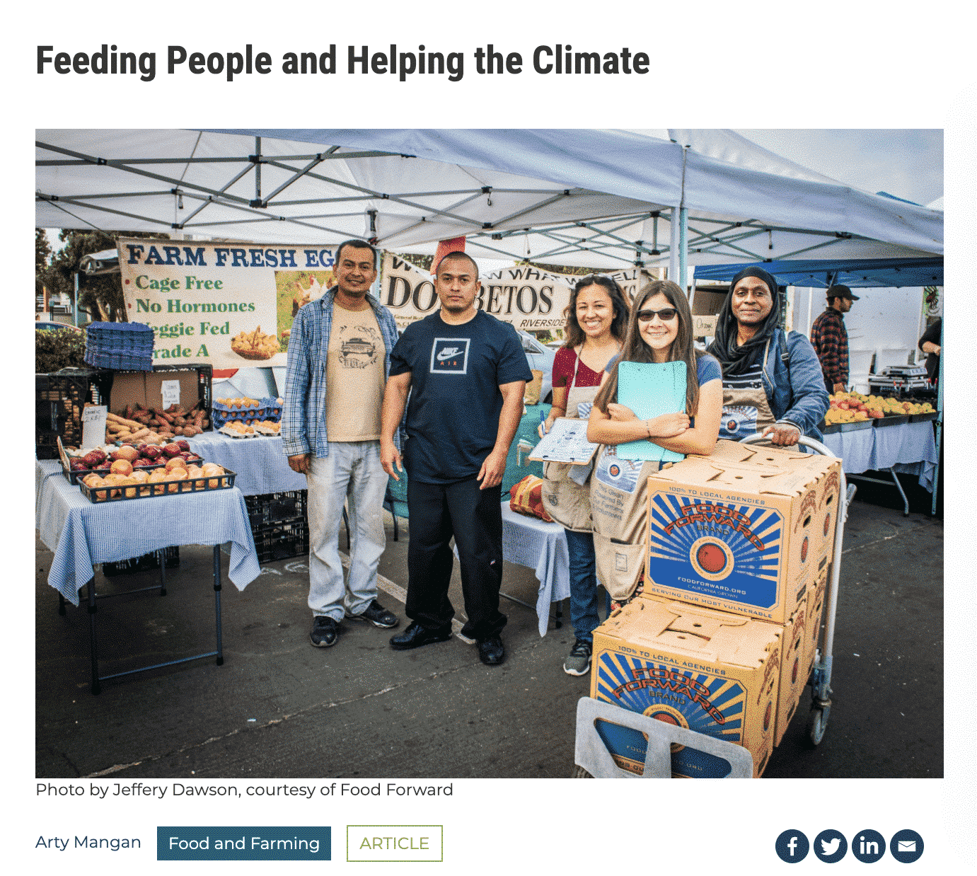 Volunteers and vendors at Farmers Market