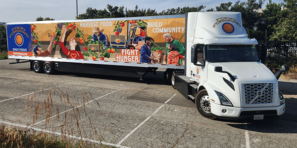 Volvo truck with Food Forward wrap on it